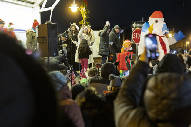 presents to the crowd